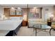 Comfortable bedroom with couch and city views at 125 E Harmon Ave # 2215, Las Vegas, NV 89109