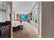 Bright bedroom with neutral colors, king bed, city views, and a convenient bar area at 125 E Harmon Ave # 2215, Las Vegas, NV 89109
