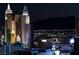 The illuminated skyline of Las Vegas at night, with notable hotels and attractions shining brightly in the darkness at 125 E Harmon Ave # 2215, Las Vegas, NV 89109