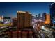 Las Vegas strip with casino lights and cityscape view at night, and active city streets at 125 E Harmon Ave # 2215, Las Vegas, NV 89109