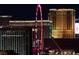 The High Roller ferris wheel illuminated at night, alongside Trump Hotel, Venetian and Palazzo hotels at 125 E Harmon Ave # 2215, Las Vegas, NV 89109