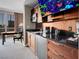 Kitchenette features modern appliances, including stainless steel refrigerator and microwave at 125 E Harmon Ave # 2215, Las Vegas, NV 89109