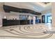 Welcoming reception area with modern design, decorative flooring, and sleek counters at 125 E Harmon Ave # 2215, Las Vegas, NV 89109