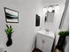 Bathroom featuring a modern vanity, contemporary fixtures, and stylish decor at 1450 Hialeah Dr # D, Las Vegas, NV 89119