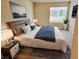 Bedroom features new flooring, neutral paint, and bright natural light at 1450 Hialeah Dr # D, Las Vegas, NV 89119