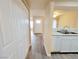 Hallway view of the living room, leading to the kitchen and a large closet at 1450 Hialeah Dr # D, Las Vegas, NV 89119
