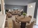 Open concept living and dining areas with neutral paint and modern furnishings at 1450 Hialeah Dr # D, Las Vegas, NV 89119