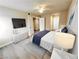 Spacious main bedroom features new flooring, a ceiling fan, and ample closet space at 1450 Hialeah Dr # D, Las Vegas, NV 89119