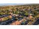 Real estate overhead picture shows a community of homes with landscaping and access to main roads at 205 Derwent Pl, Las Vegas, NV 89144