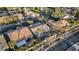 Aerial view of a property nestled in a neighborhood, boasting a private backyard pool at 205 Derwent Pl, Las Vegas, NV 89144