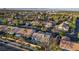 Aerial view showcasing the property nestled within a well-manicured neighborhood with mature trees and landscaping at 205 Derwent Pl, Las Vegas, NV 89144