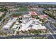 School campus aerial featuring multiple buildings, sports fields, and ample parking at 205 Derwent Pl, Las Vegas, NV 89144
