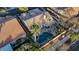 Aerial view showcases the backyard pool, patio, and landscaping of this charming home at 205 Derwent Pl, Las Vegas, NV 89144