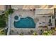 Overhead shot showcasing backyard pool, spa, covered patio and manicured landscaping at 205 Derwent Pl, Las Vegas, NV 89144