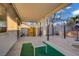 Backyard featuring a covered patio area, adjacent to a refreshing swimming pool at 205 Derwent Pl, Las Vegas, NV 89144