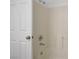 Bathroom featuring a tiled shower and bathtub with a door at 205 Derwent Pl, Las Vegas, NV 89144