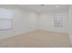Bright bedroom with hardwood floors and a large window allowing ample natural light at 205 Derwent Pl, Las Vegas, NV 89144