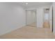 Clean bedroom with wood floors and a mirrored closet at 205 Derwent Pl, Las Vegas, NV 89144