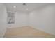 Bedroom with hardwood floors and a large window allowing ample natural light at 205 Derwent Pl, Las Vegas, NV 89144
