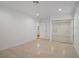 Spacious bedroom with wood floors, modern closet doors, and a view of the en suite bathroom at 205 Derwent Pl, Las Vegas, NV 89144