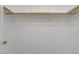 Empty closet with wood trim and white walls, perfect for organizing clothes at 205 Derwent Pl, Las Vegas, NV 89144
