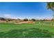 Expansive green field with scenic mountain views, perfect for community events and outdoor activities at 205 Derwent Pl, Las Vegas, NV 89144