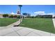 Well-kept community park with green spaces and nearby businesses, ideal for relaxation and leisure at 205 Derwent Pl, Las Vegas, NV 89144