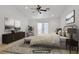 Relaxing main bedroom with a ceiling fan and neutral colors, offers a serene retreat at 205 Derwent Pl, Las Vegas, NV 89144