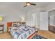 Bright bedroom with ceiling fan, hardwood floors and ensuite bathroom at 2050 W Warm Springs Rd # 1822, Henderson, NV 89014
