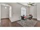Inviting dining area with sleek hardwood floors, modern ceiling fan, and natural light at 2050 W Warm Springs Rd # 1822, Henderson, NV 89014