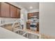 Functional kitchen featuring stainless steel appliances, granite counters, and wood cabinetry at 2050 W Warm Springs Rd # 1822, Henderson, NV 89014