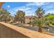 Street view of desert landscaping in front of the home in a residential neighborhood at 2050 W Warm Springs Rd # 1822, Henderson, NV 89014