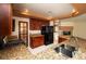 Gourmet kitchen with granite counters, stainless steel appliances, and dark wood cabinetry at 2105 Harbor Cliff Dr, Las Vegas, NV 89128
