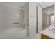 Well-lit bathroom with a tub-shower combination and access to a neighboring room at 232 Morgyn Ln # 6, Boulder City, NV 89005