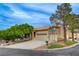 Charming home featuring a two-car garage, desert landscaping and corner lot at 232 Morgyn Ln # 6, Boulder City, NV 89005