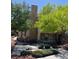 Charming condo building with lush landscaping and a well-maintained exterior at 232 Morgyn Ln # 6, Boulder City, NV 89005