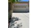 Spacious two-car garage with neutral paint, offering ample parking and storage at 232 Morgyn Ln # 6, Boulder City, NV 89005