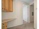 Hallway with built-in desk and storage, providing convenient workspace and organization at 232 Morgyn Ln # 6, Boulder City, NV 89005