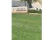 Welcome to Hemenway Park sign with well-maintained grass and some chairs in the background at 232 Morgyn Ln # 6, Boulder City, NV 89005