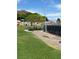 Beautiful park featuring mature trees, a playground and a tennis court at 232 Morgyn Ln # 6, Boulder City, NV 89005