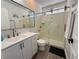 Well-lit bathroom featuring a walk-in shower and modern vanity at 2429 Worchester Rd, Henderson, NV 89074