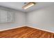 Bright bedroom with wood floors and plantation shutters providing natural light at 2505 Palmridge Dr, Las Vegas, NV 89134