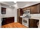 Gourmet kitchen boasts stainless steel appliances and granite countertops at 2505 Palmridge Dr, Las Vegas, NV 89134
