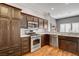 Gourmet kitchen features stainless steel appliances, granite counters, and custom cabinetry at 2505 Palmridge Dr, Las Vegas, NV 89134
