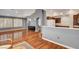 Open floor plan showcasing the living room with wood floors and natural light at 2505 Palmridge Dr, Las Vegas, NV 89134