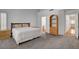 Spacious main bedroom with a vaulted ceiling and a connecting bathroom at 2505 Palmridge Dr, Las Vegas, NV 89134
