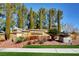 A community entrance sign with well maintained landscaping at 2612 Kindness Ct, North Las Vegas, NV 89031