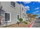 Two-story home with manicured landscaping and a neutral color scheme at 2612 Kindness Ct, North Las Vegas, NV 89031