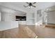 A spacious living room offering wood-look floors and an open floorplan at 2612 Kindness Ct, North Las Vegas, NV 89031