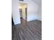 Bedroom featuring wood floors, and an open bathroom entrance at 3324 Haven Beach Way, Las Vegas, NV 89117